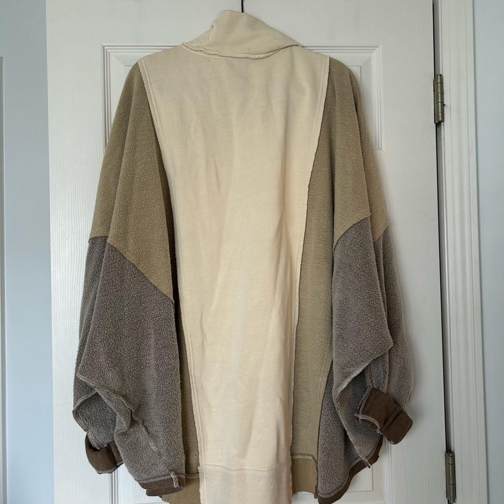 Brown/cream free people v neck oversized sweater; size L; $60